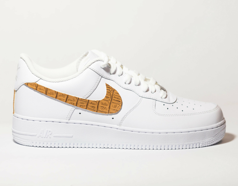 black air forces with gold check