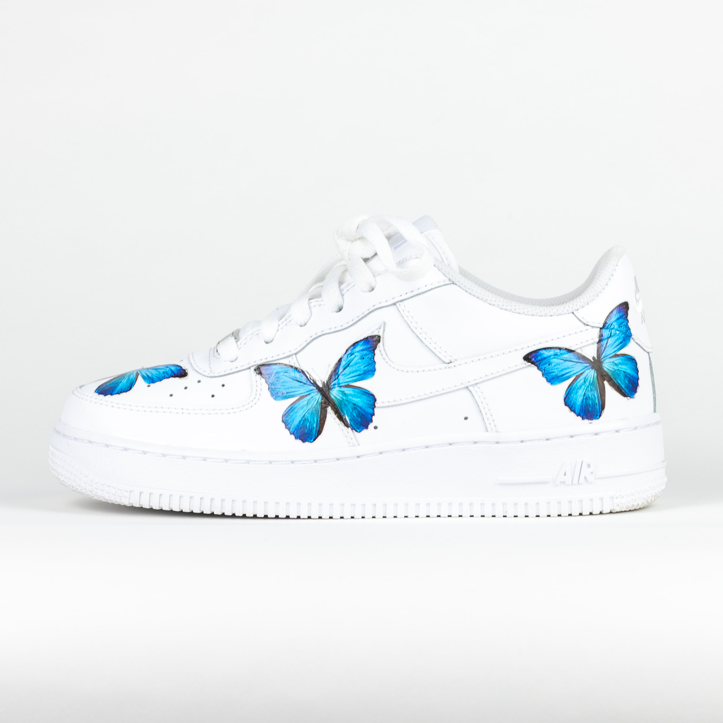 air force ones with blue butterflies