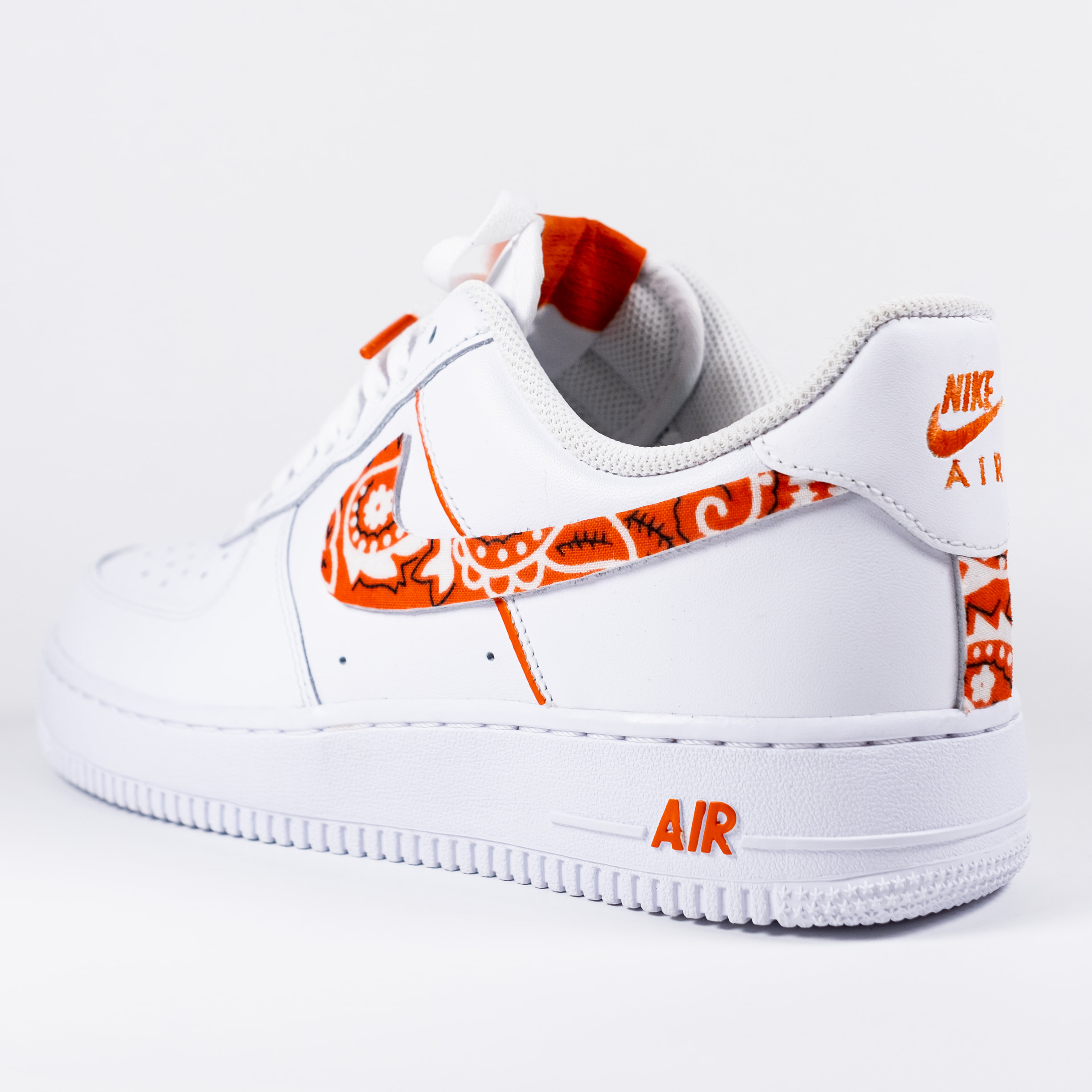 orange and white air force 1s